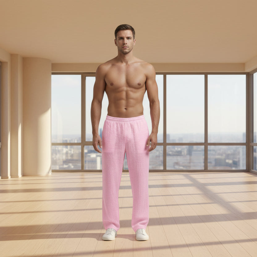 Men wearing solid color linen casual pants with loose fit and wide legs for summer beach wear
