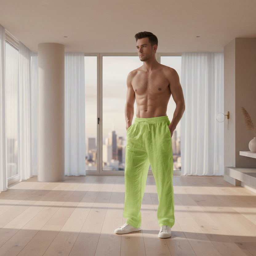 Men wearing solid color linen casual pants with loose fit and wide legs for summer beach wear